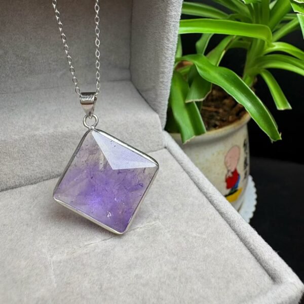Natural Amethyst Faceted Pendant in a Copper Bezel
