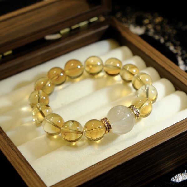 Rutilated Quartz Bracelet with Yellow Quartz Point